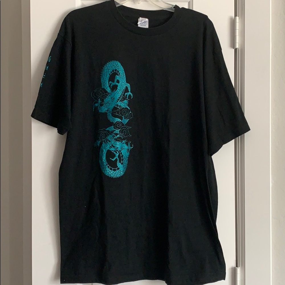 Black t-shirt with glittery turquoise dragons